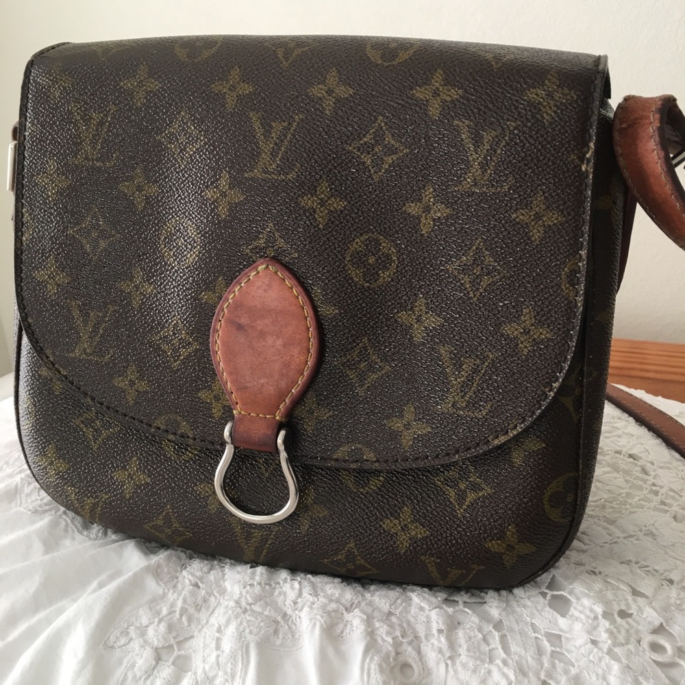 Authentic vintage Louis Vuitton cross body bag.